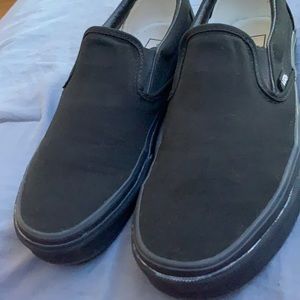Black slip on vans men’s 7 woman’s 8.5